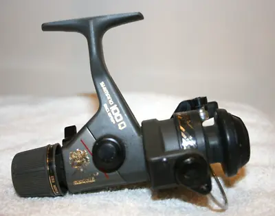 Vintage Fishing Shimano 100Q AX Spinning Reel Ball Bearing Graphite Very Nice • $24.95