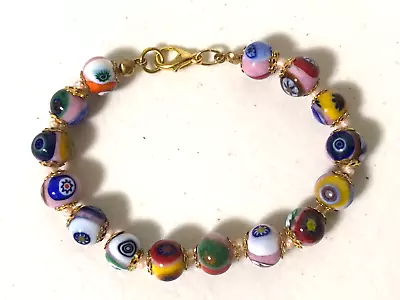 Gold Tone Filigree Spacers Millefiori Glass Beaded Hand Knotted Bracelet 7  • $21.99