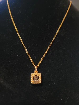 $75 • Buy Louis Vuitton Dainty Mini Charm On A 18  Inch Gold Pl Chain.