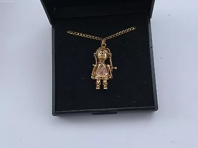 AN ARTICULATED 9ct GOLD GEM ENCRUSTED RAG DOLL ON A 16  BELCHER CHAIN. 3.24grms • £204.99