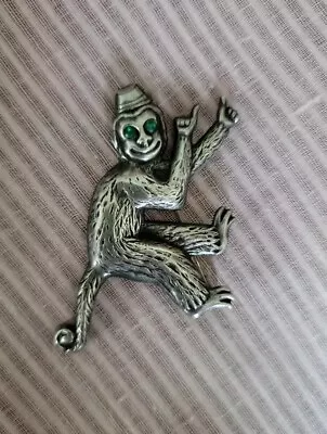 Vintage Sterling Silver Organ Grinder's Monkey With Green Rhinestone Eyes Pin  • $39.99