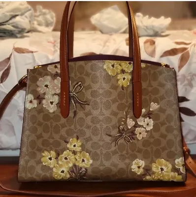 Coach Charlie Carryall In Signature Canvas With Prairie Floral Print 54650 • $215