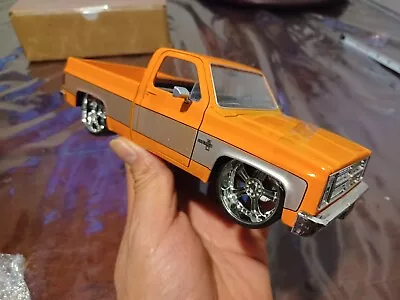 Jada 1/24 Just Trucks - 1985 Chevy C-10 - Orange/silver • $40