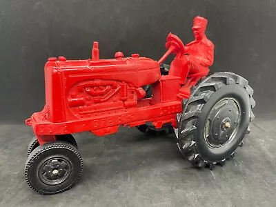 Auburn Red Rubber Tractor & Driver 572 • $34.99