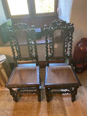 2 GOTHIC THRONE STYLE OAK HALL CHAIRs LOVELY CARVING. SLIGHT DAMAGE TO ONE ITEM • £99