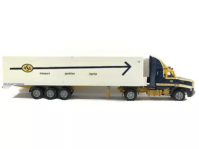 Conrad ASG Transport Volvo NL12 Blue / Yellow Tractor Trailer • $167.99