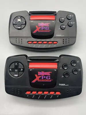 Lot Of 2 Tiger Electronics R-Zone X.P.G Xtreme Pocket Game AS IS FOR PARTS ONLY • $129.99
