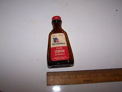 Vintage 1 Oz. McCormick Pure Lemon Extract Amber Bottle  • $12