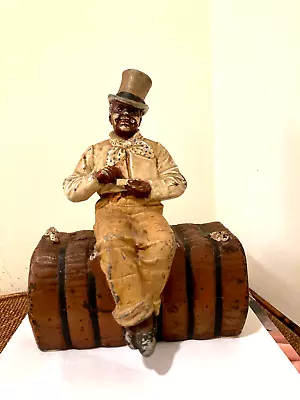 Cast Iron Doorstop: MAN ON BALE OF COTTON • $525