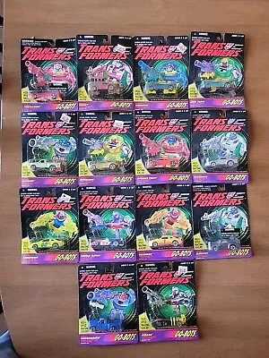 Hasbro Transformers 1994 G2 Go-Bots Super Speed Racers. Lot Of 14 Unopened.  • $375