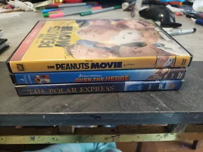 3  Random Childrens Dvds Peanuts. Over The Hedge. Polar Express • $0.99