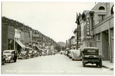 1940s Idaho Springs Colorado Miner Street Real Photo - Many Signs • $10