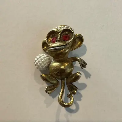 Vintage Brooch Pin Monkey Holding Golf Ball Gold Tone Ape Red Eyes • $10.02