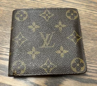 LOUIS VUITTON Authentic  Monogram Men’s Bifold Wallet Made In Spain CA0998 • $109