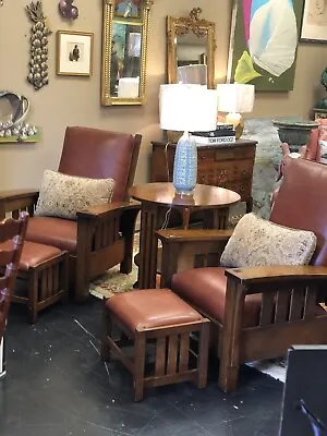 Pair L. & J. G. STICKLEY  Bow Arm Mission  Leather Morris Chairs With Ottomans • $8500