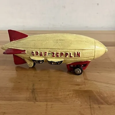 Graf Zepplin -Yellow Cast Iron Vintage Blimp Toy On Rolling Wheels - 8” Long • $59.99