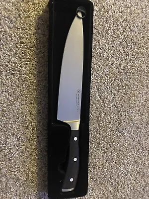$230 • Buy Wusthof Ikon Blackwood 8 Inch Chef's Knife