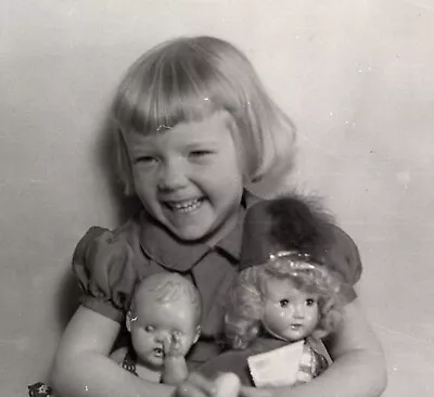 Vtg Snapshot Photo Adorable Little Blonde Girl Holds Dolls Curls Majorette Hat • $12.99