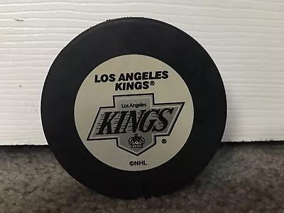 Vintage Los Angeles Kings NHL Hockey Puck Majestic Realty Co Promotional Puck  • $9.26