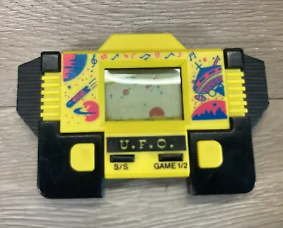 Vintage 1980s RARE Melody Alarm U.F.O. Handheld Game LCD Yellow/Black • $44.55