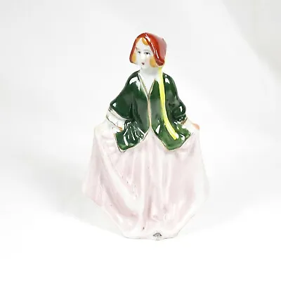  Made In Occupied Japan Girl Dancing Bowing Green Coat Pink Dress Figurine  • $23.79
