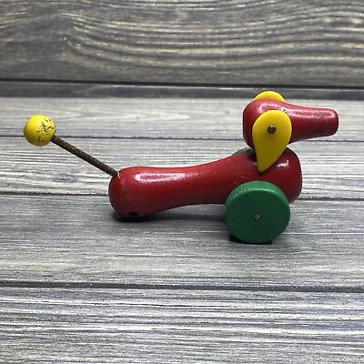 Vintage Wooden Pull Toy Red Dog Yellow Ears Green Wheels 3” • $15