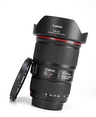 Canon EF 16-35mm F4 L IS USM Autofocus Wide Angle Zoom Lens F&R Lens Caps & Hood • £449.99