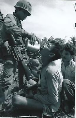 Vietnam  War  Photos --    Soldiers With Viet Cong Prisoner • $3.99