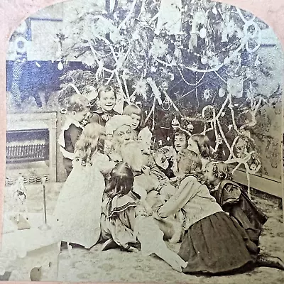 1897 STEREOVIEW Photo SANTA CLAUS Is CAPTURED By Children CHRISTMAS TREE Kilburn • $29.50