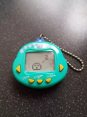 Rare Rakuraku Dinokun/Dinkie Dino Virtual Pet/tamagotchi - Teal • £0.99