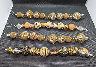 Lot Of Four Bead Strands Ornate Textured Multible Designs Focal Beads Jewelry • $14.95