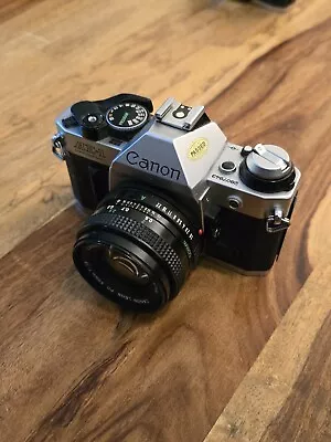 Canon AE-1 Program SLR With 50mm F/1.8  • £60