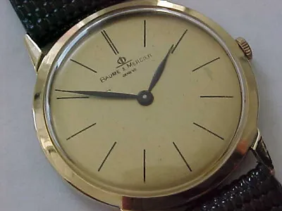 Vintage 14 Karat Solid Gold Baume & Mercier Mans Wristwatch Gold Dial • $625