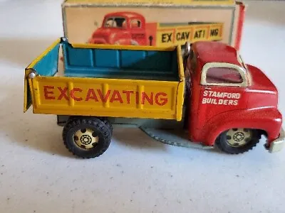 Vintage LINE MAR Stamford Builders GMC Litho Hauling Dumping Truck Metal Tin Toy • $100
