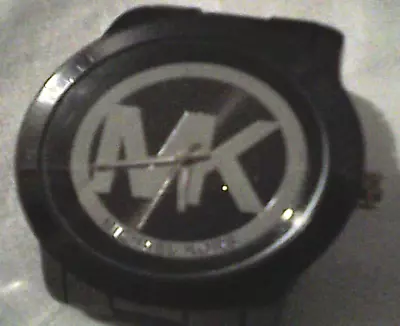 Michael Kors All Black Watch W/silver  Mk  Ctr Face  And Written Out On Circle • $55