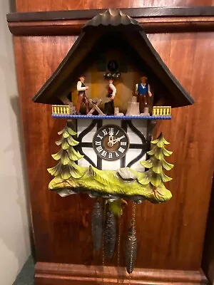 Vintage Black Forest GERMAN MUSICAL  Cuckoo Clock W Men Chopping. Sawing • $122.50