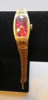 Seiko Gold Tone Women's Watch 1520-3629 Ruby Colored Oblong Face Small • $30