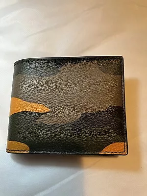 Coach Camo Wallet Pre Owned  • $75