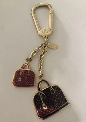 $179 • Buy Louis Vuitton Bag / Keychain In Brown, Red And Gold