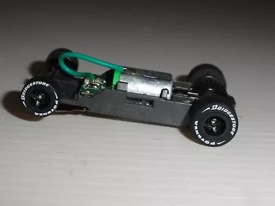 AFX MEGA G+ HO SLOT 1.7 NARROW CHASSIS Stock BLACK RIMS AND WHITE LETTERED TIRES • $24.95