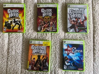 $50 • Buy Guitar Hero Xbox 360 Lot Of 4 Games And BONUS Rock Revolution Game 