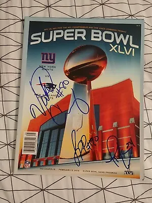 Super Bowl XLVI Program Signed By Victor Cruz And Jason Pierre Paul • $80