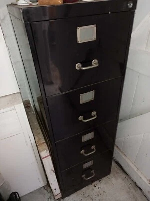 Filing Cabinet - 4 Drawer • $5