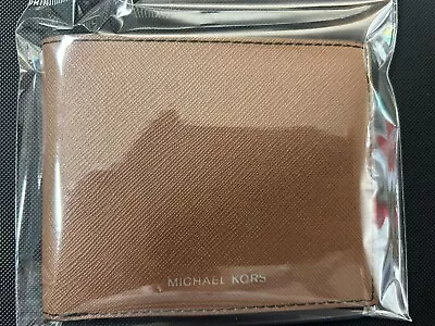 Michael Kors Men’s Wallet • $15