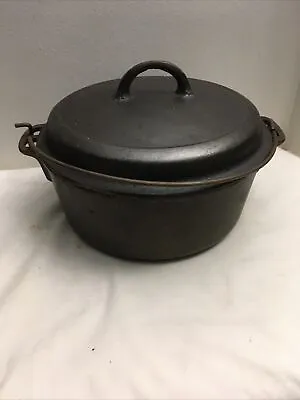 Cast Iron Dutch Oven With Griswold 8 Self Basting Lid And Wagner 5 Quart Pot • $170