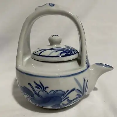 Vintage Blue And White Ceramic Round Floral Design Teapot Lided • $16.50