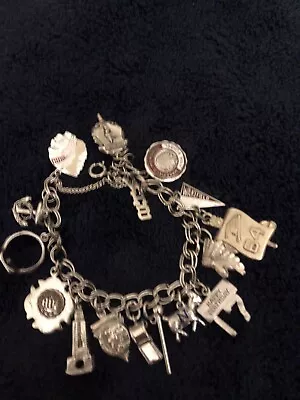 Sterling Silver Vintage Charm Bracelet With 16 Charms  • $70