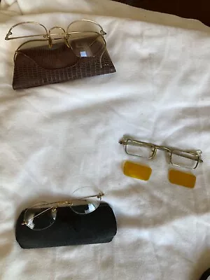3 Pair Vintage Eyeglasses. 1 Rimless 1 Wire Frame 1 Metal Frame. 2 Cases.  • $31
