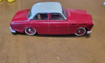 Tekno 810 - Volvo Amazon 121/122 4 Doors Red Roof White Top • $79