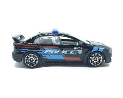 Matchbox Mitsubishi Lancer Evolution X Police Car Black Unit LOOSE • $8